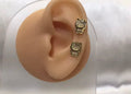 Gold textured ear climber studs