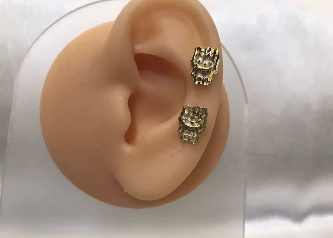 Gold textured ear climber studs